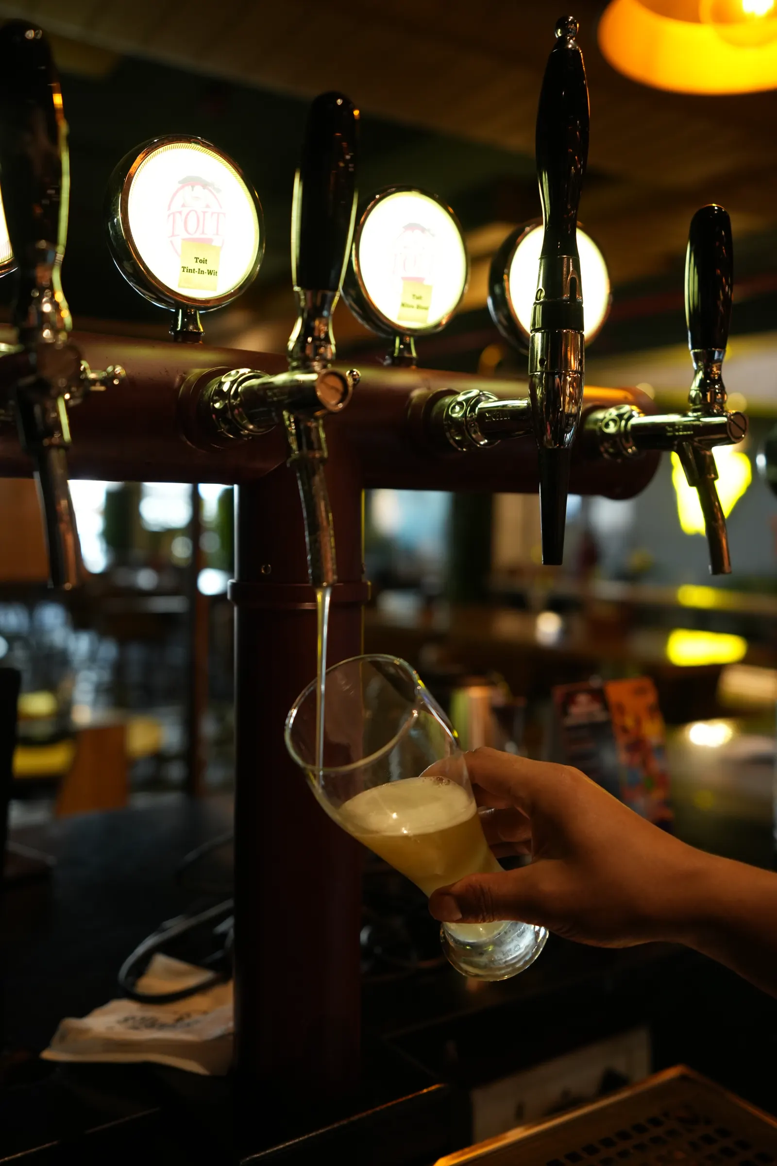 Fresh beer being poured from the tap