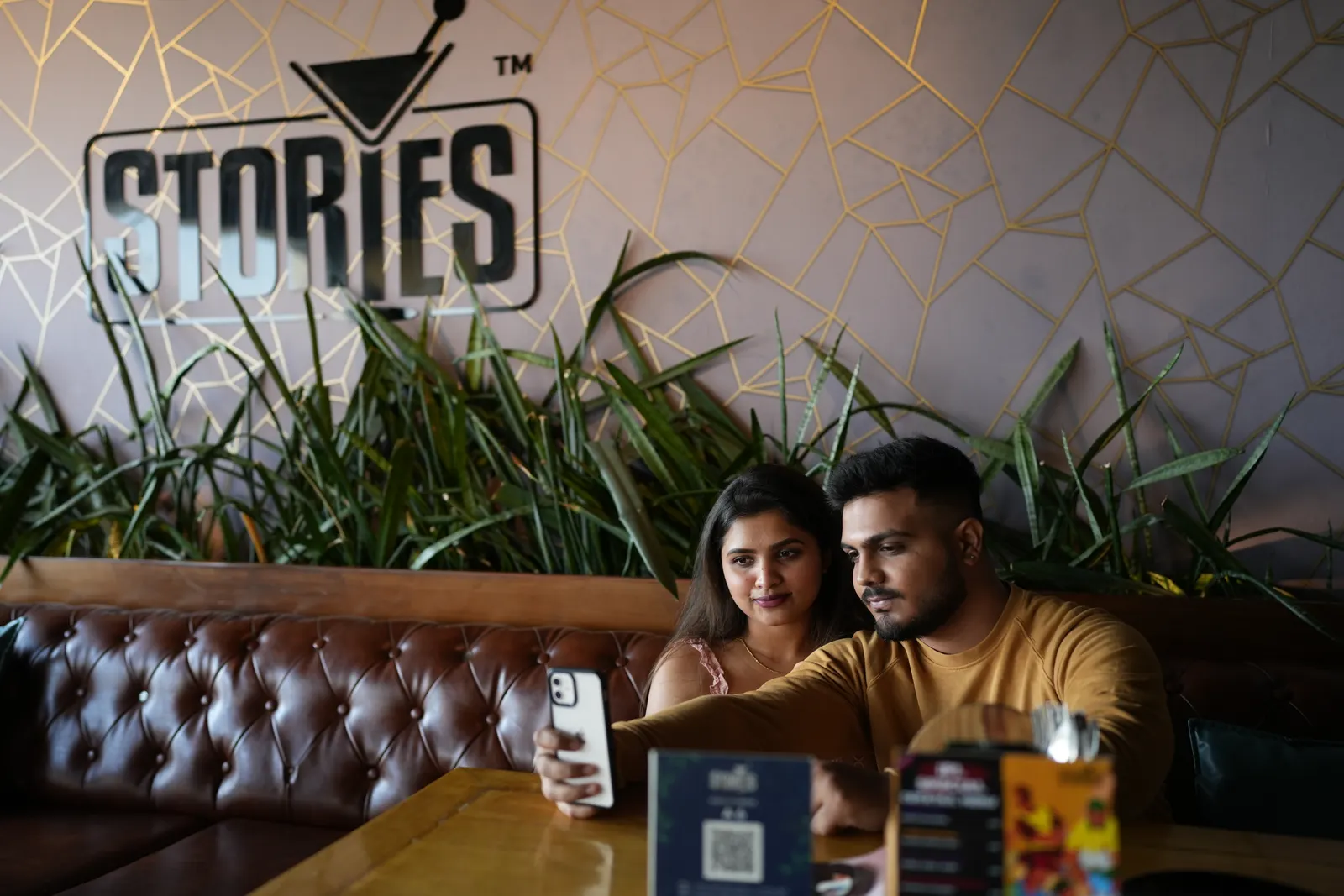 Guests gathered in the lounge at Stories Bar & Kitchen
